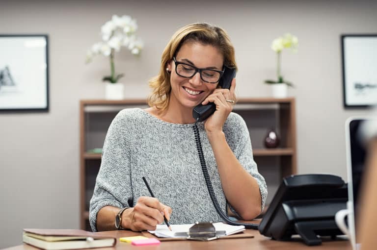 Woman-Smiling-on-Phone-IMG