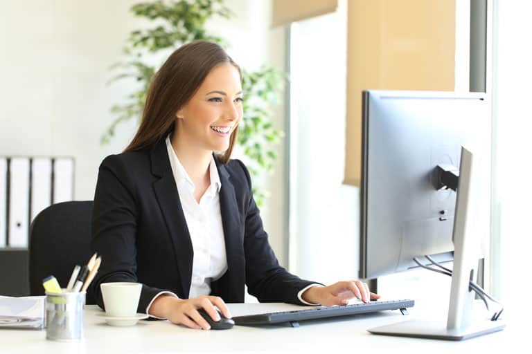 Woman-Smiling-with-Computer-IMG
